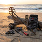Metal detector and accessories on a beach